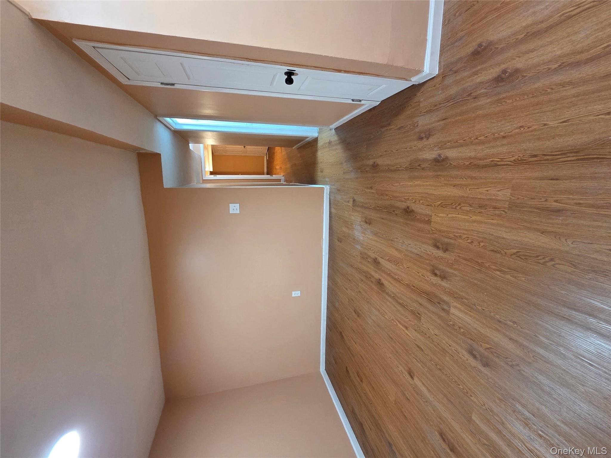 4160 Baychester Avenue Bronx, NY 10466 - Photo 22 of 24 a view of a room with wooden floor