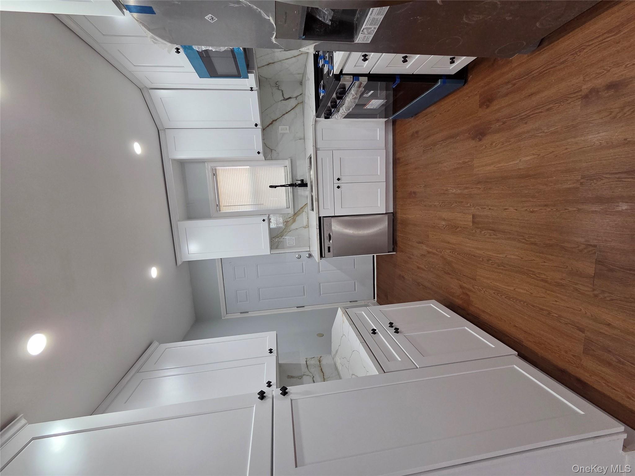 4160 Baychester Avenue Bronx, NY 10466 - Photo 6 of 24 a large kitchen with a lot of counter space