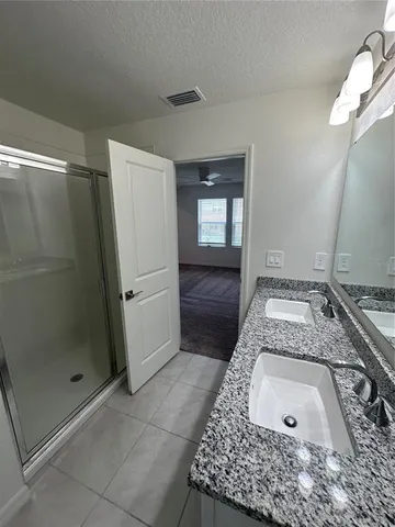 an empty room that has a window in it