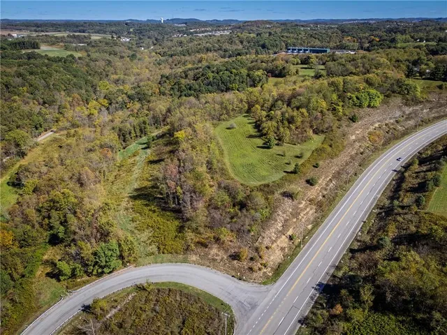 a view of a yard with an ocean