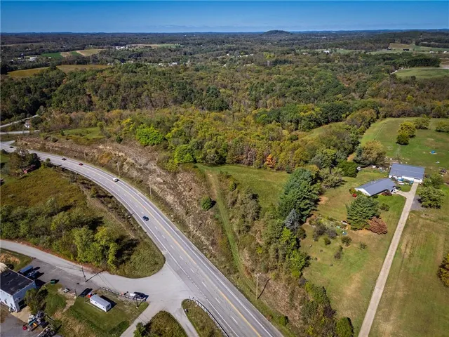 an aerial view of a city with lots of residential buildings