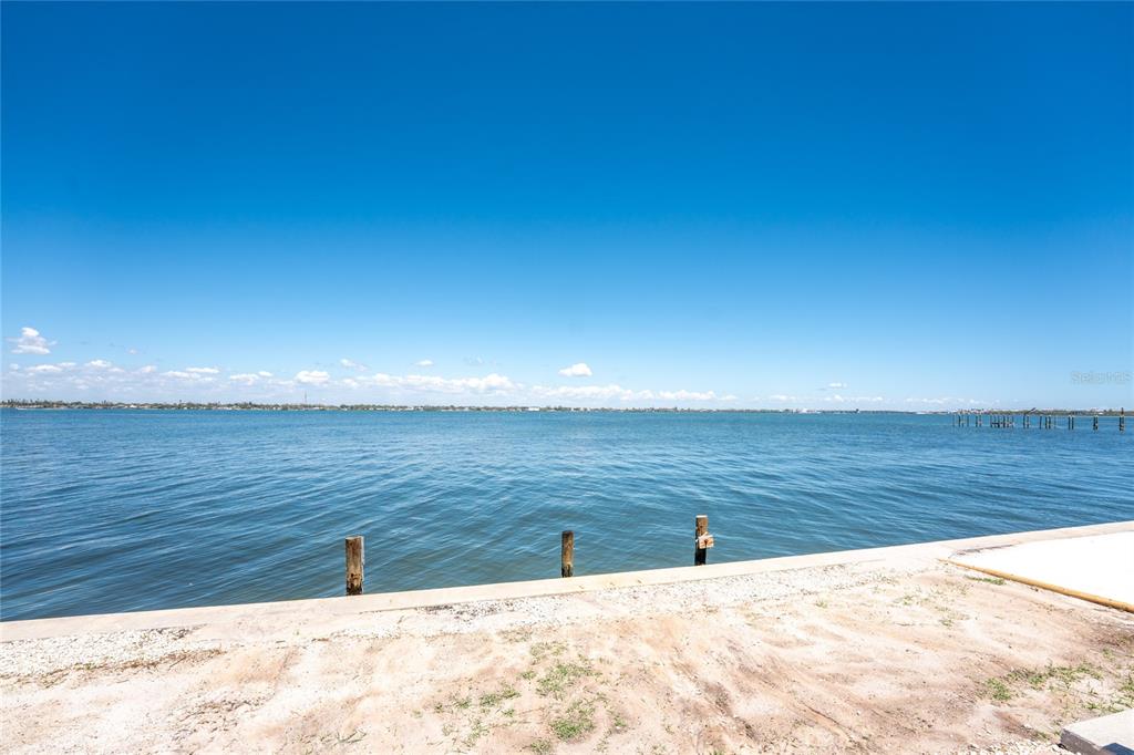 5041 North Beach Road, Unit 2A AND 2B Englewood, FL 34223 - Photo 57 of 90 a view of an ocean beach