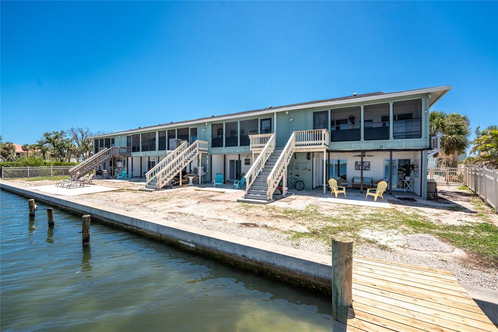 5041 North Beach Road, Unit 2A AND 2B Englewood, FL 34223 - Photo 59 of 90 a view of house with swimming pool and sitting area