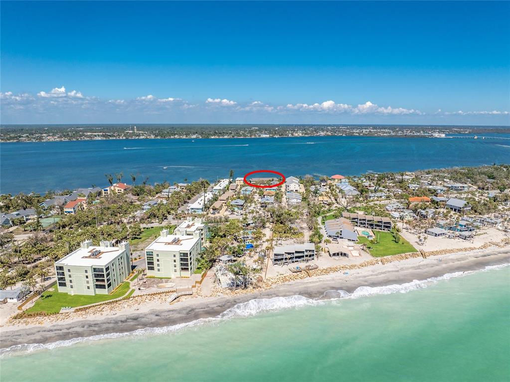 5041 North Beach Road, Unit 2A AND 2B Englewood, FL 34223 - Photo 85 of 90 a view of a city with an ocean view