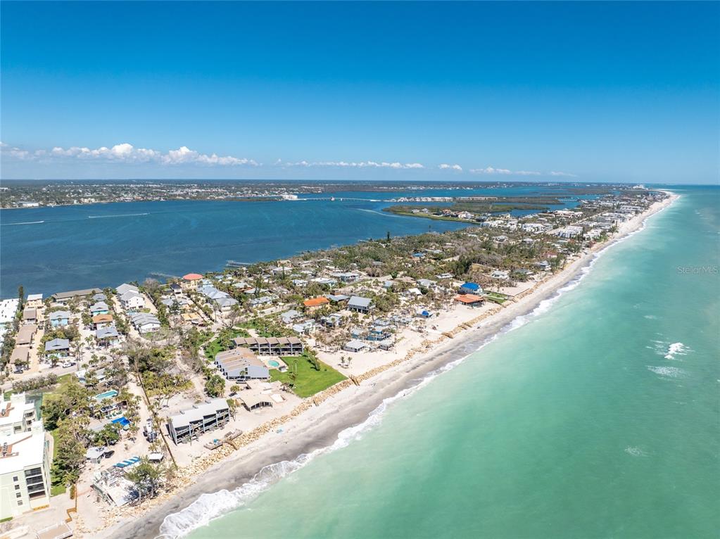 5041 North Beach Road, Unit 2A AND 2B Englewood, FL 34223 - Photo 88 of 90 a view of a lake from a balcony