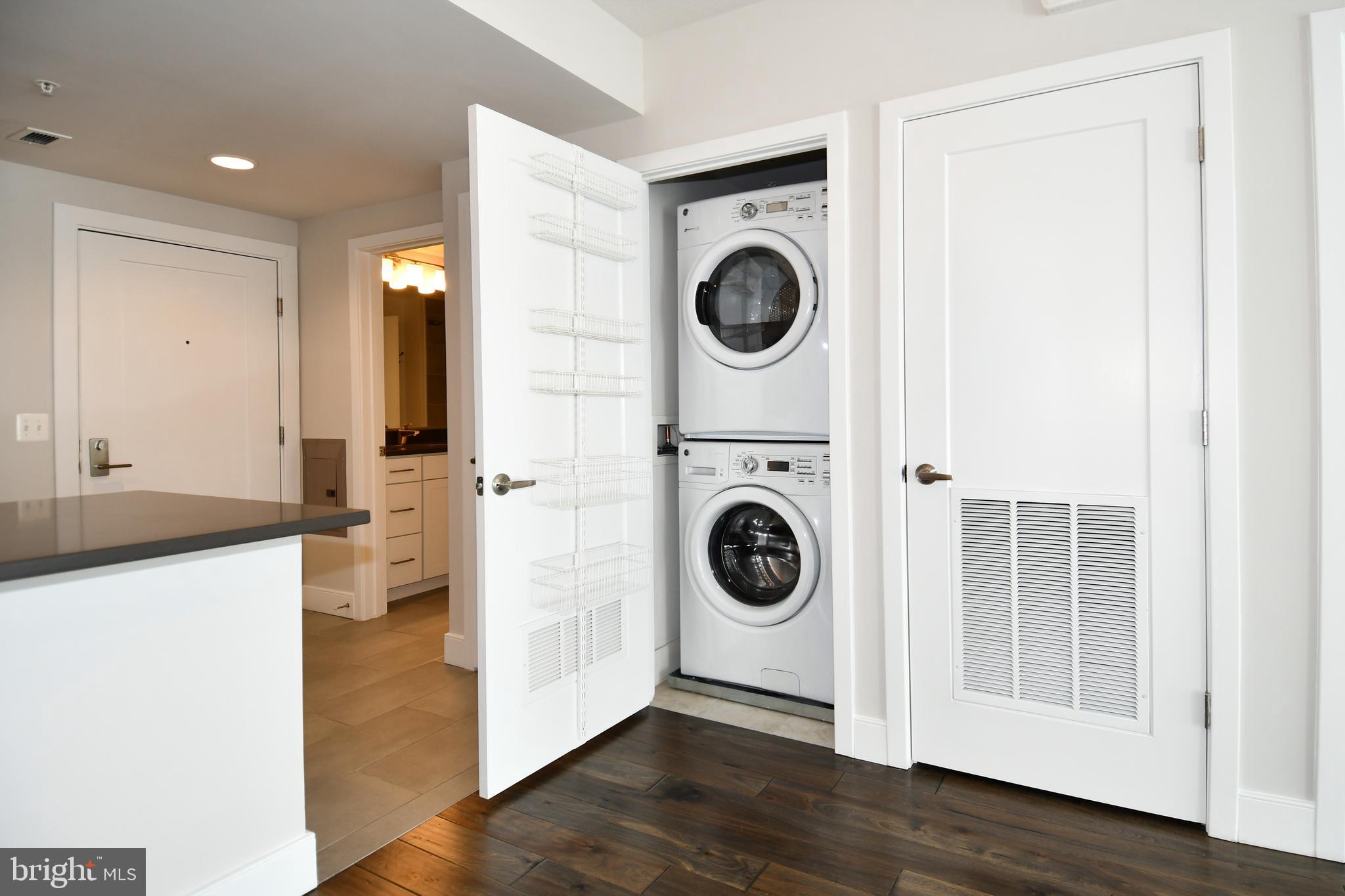 50 Florida Avenue Northeast, Unit 523 Washington, DC 20002 - Photo 16 of 38 a view of a kitchen with washer and dryer