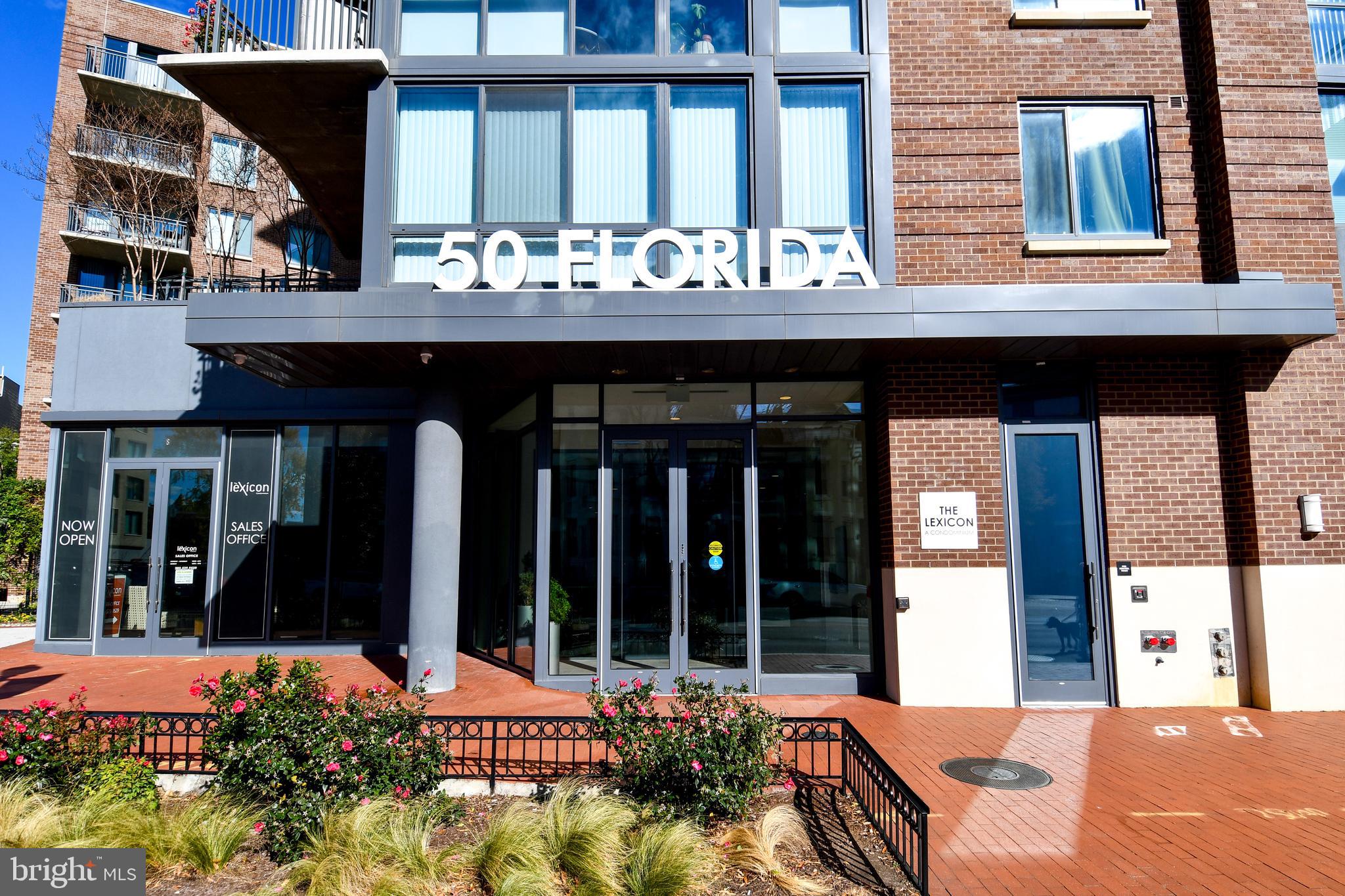 50 Florida Avenue Northeast, Unit 523 Washington, DC 20002 - Photo 3 of 38 a view of a brick house with large windows and plants