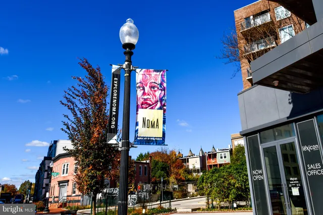 a lamp on the side of a building