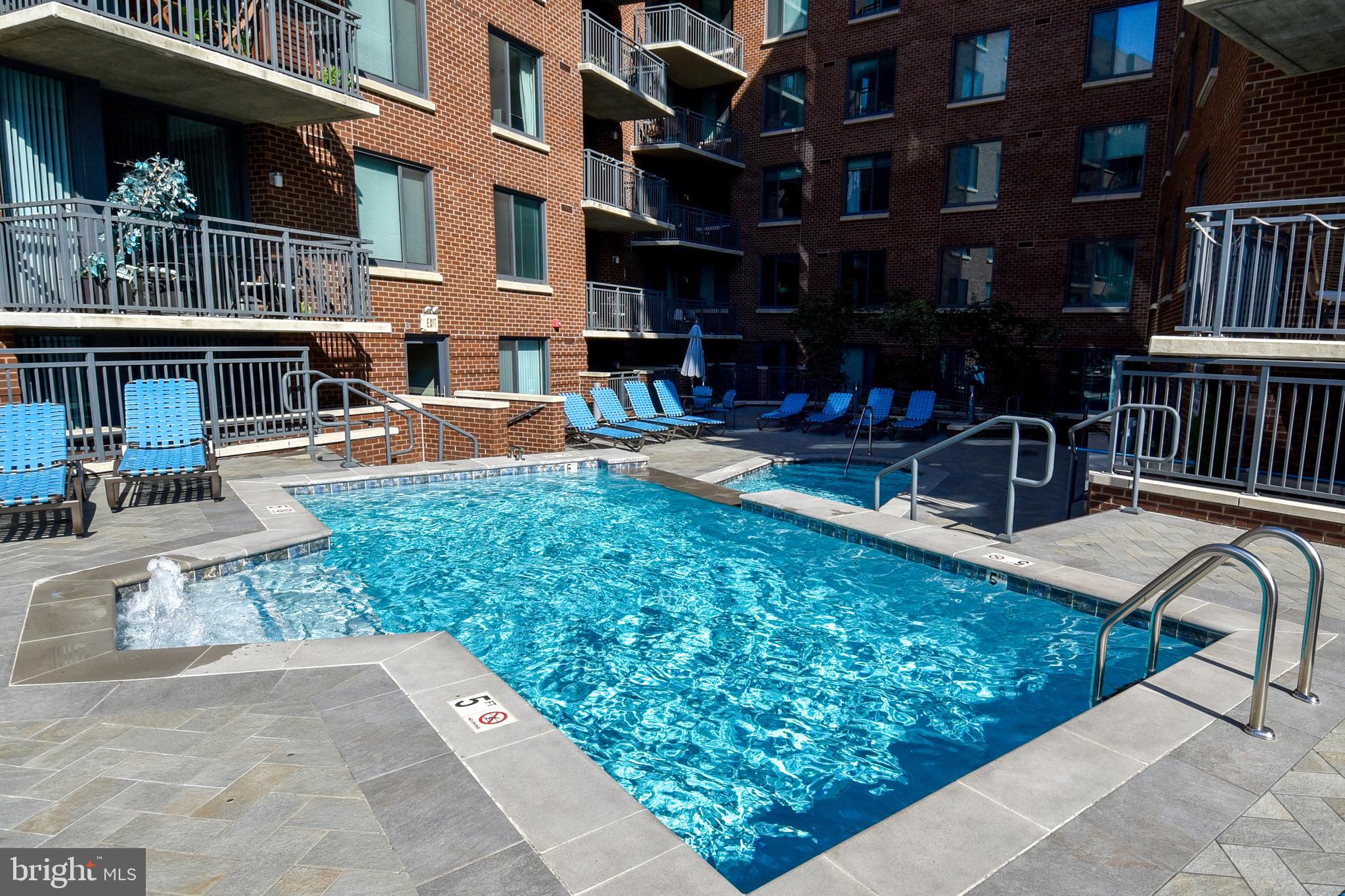 50 Florida Avenue Northeast, Unit 523 Washington, DC 20002 - Photo 38 of 38 a view of a swimming pool with a patio