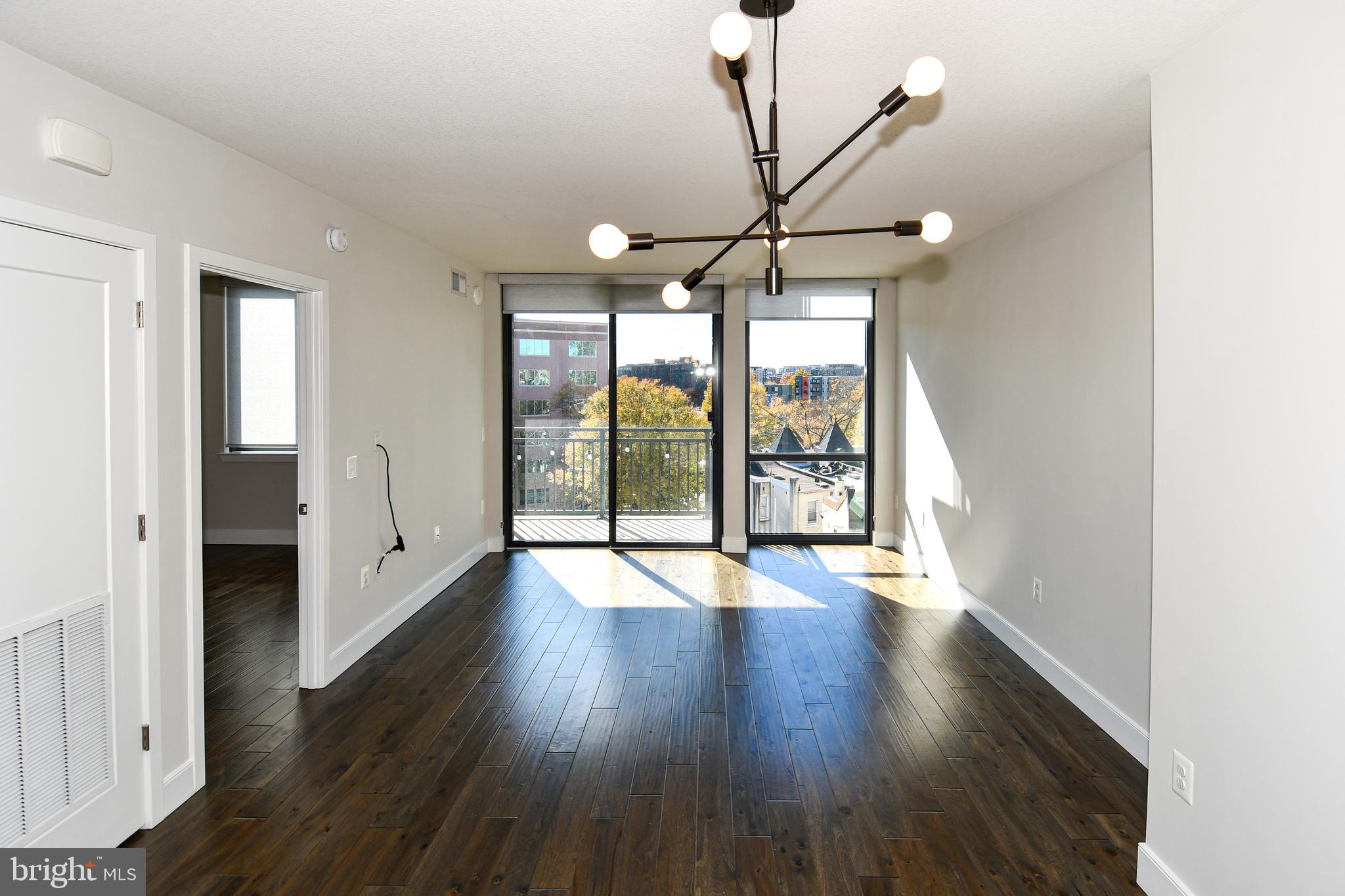 50 Florida Avenue Northeast, Unit 523 Washington, DC 20002 - Photo 7 of 38 a view of an entryway with wooden floor