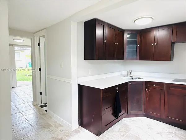 a bathroom with a sink double vanity and a mirror
