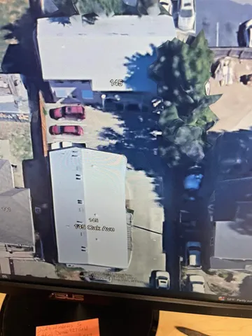 a car parked in front of a building