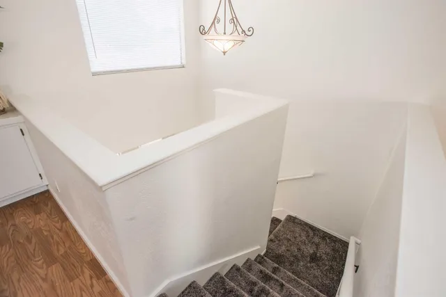 a view of an entryway with wooden floor