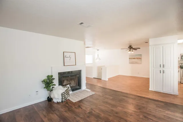 a kitchen with a sink and a refrigerator