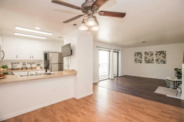 an empty room with wooden floor