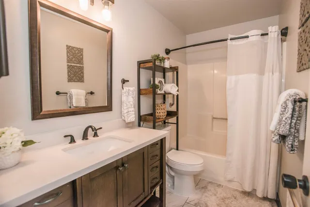 a view of a balcony with wooden floor