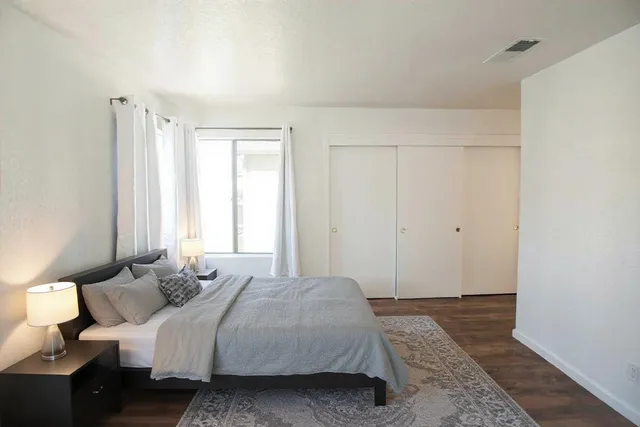 a view of a house with a backyard