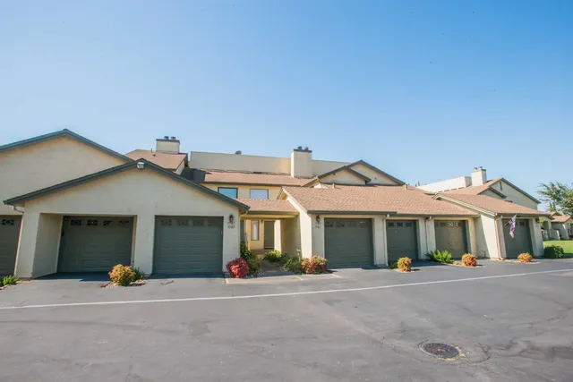a view of a garden with a bench