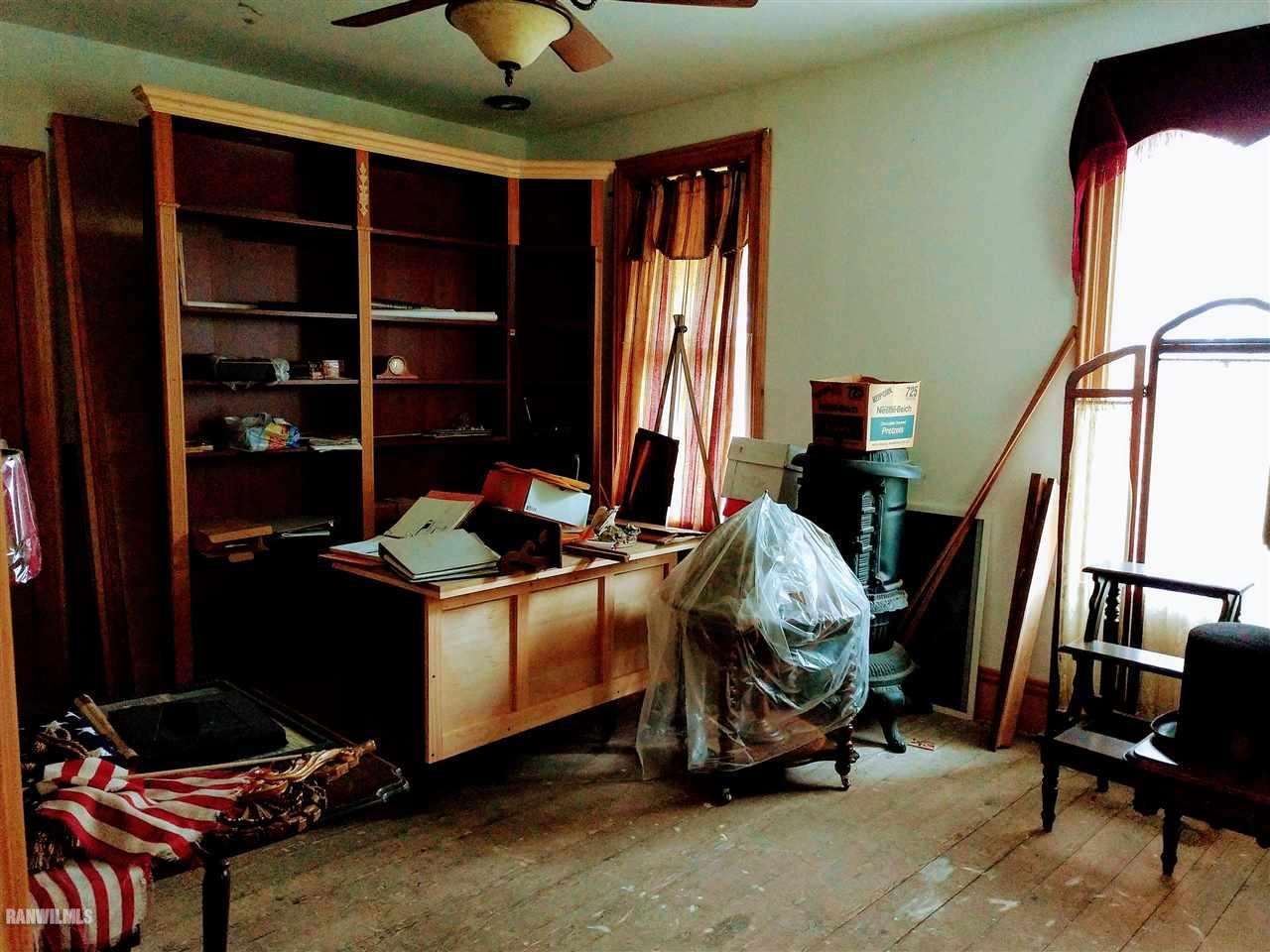 19129 Cyclone Ridge Road Mount Carroll, IL 61053 - Photo 11 of 33 a room with furniture and musical instruments