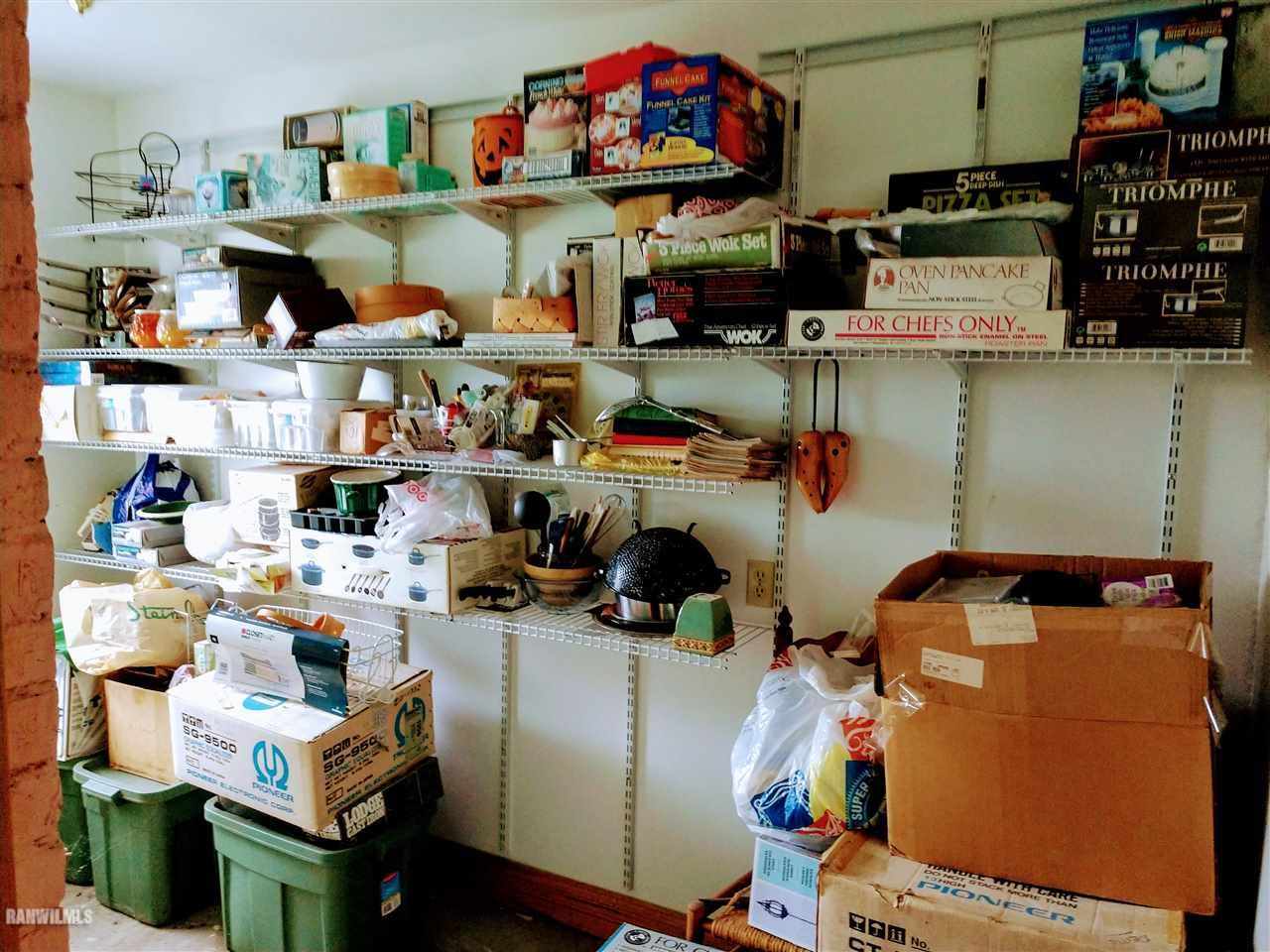 19129 Cyclone Ridge Road Mount Carroll, IL 61053 - Photo 16 of 33 a room with storage and utility