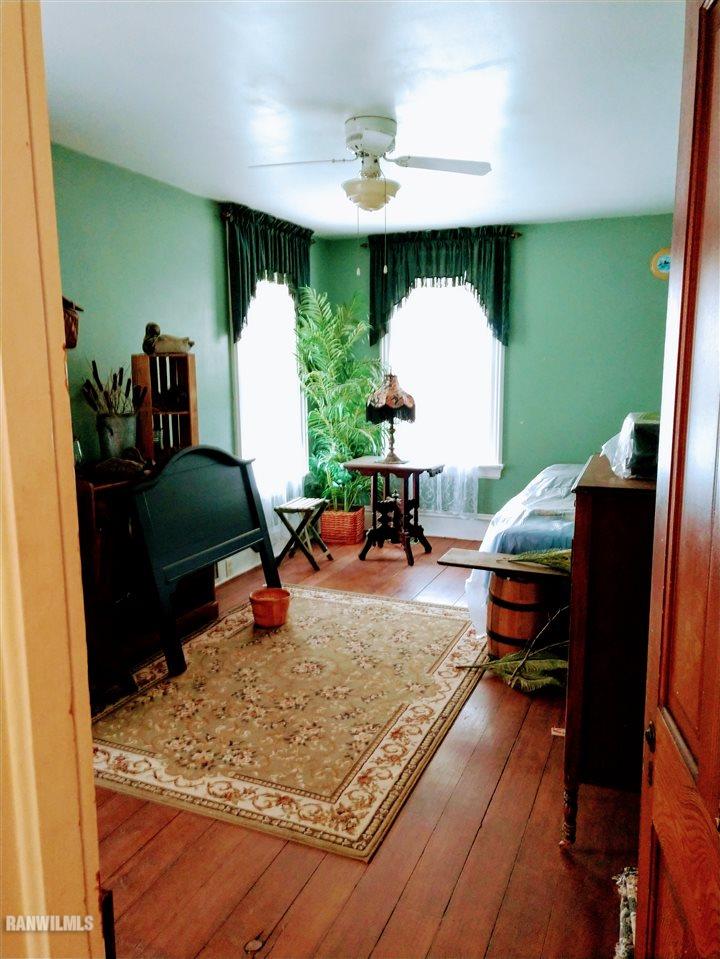 19129 Cyclone Ridge Road Mount Carroll, IL 61053 - Photo 18 of 33 a living room with furniture and a wooden floor
