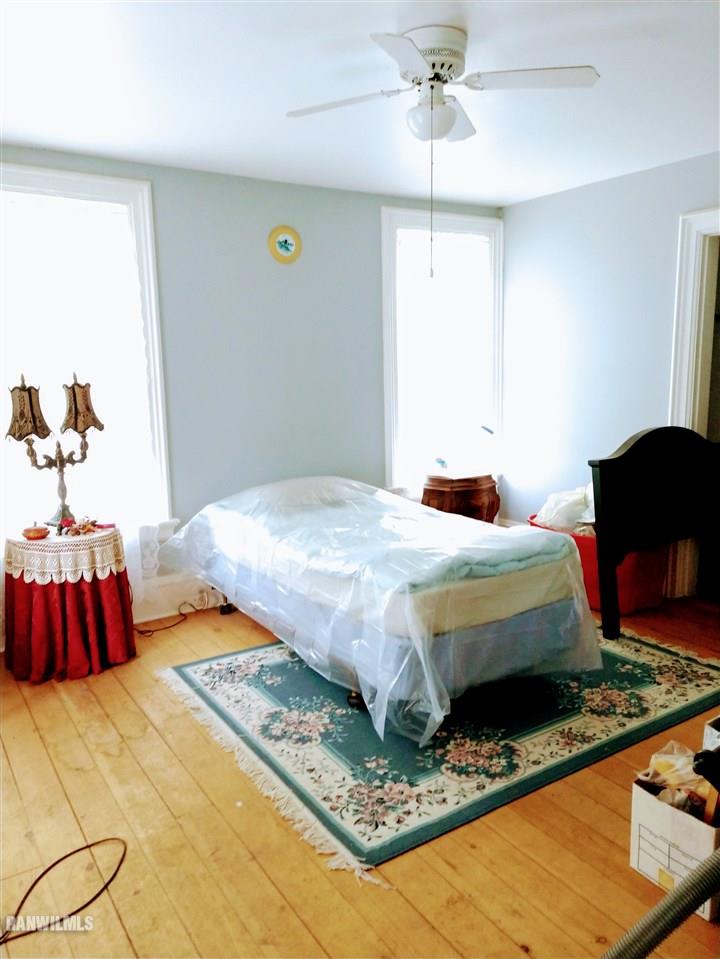 19129 Cyclone Ridge Road Mount Carroll, IL 61053 - Photo 20 of 33 a bedroom with a bed and window