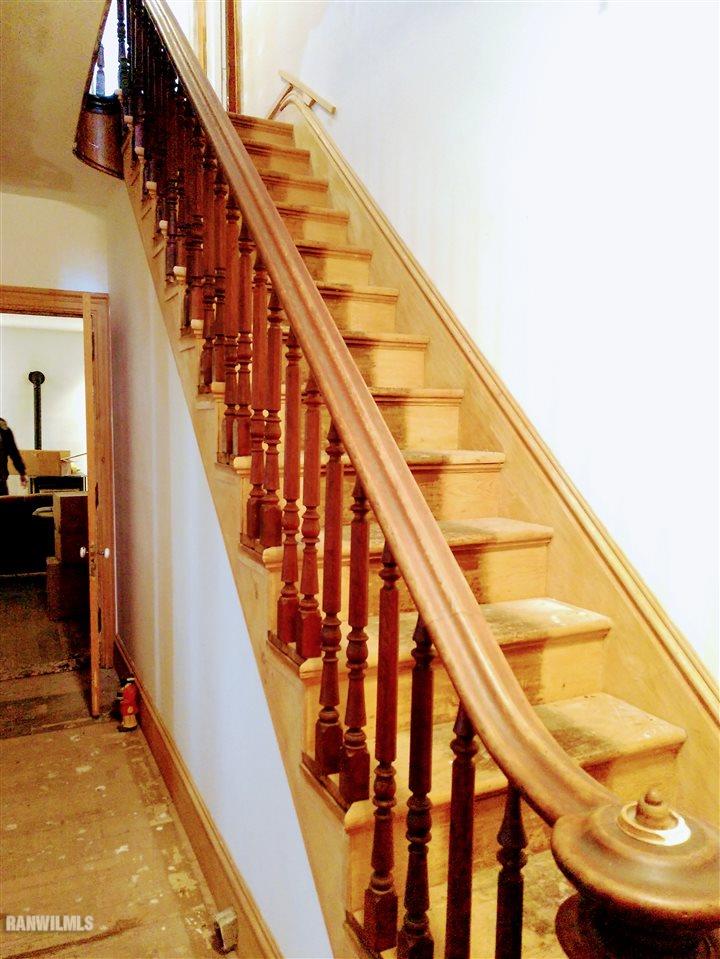 19129 Cyclone Ridge Road Mount Carroll, IL 61053 - Photo 6 of 33 a view of staircase with wooden floor and white walls