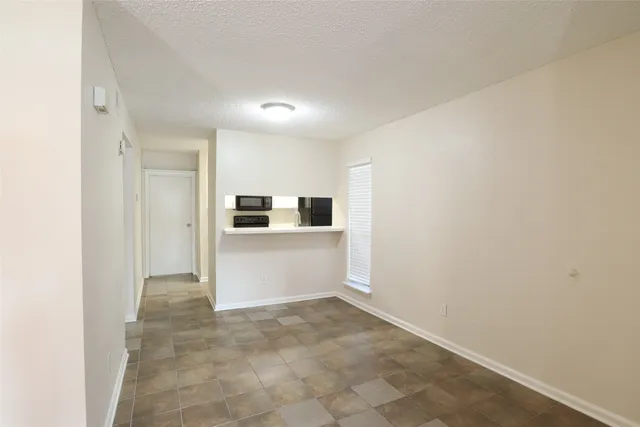 a view of a room with an empty space