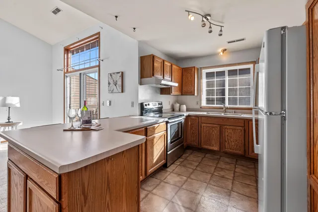 $215,000 | 2005 South 102nd Street, Unit E, West Allis, WI 53227