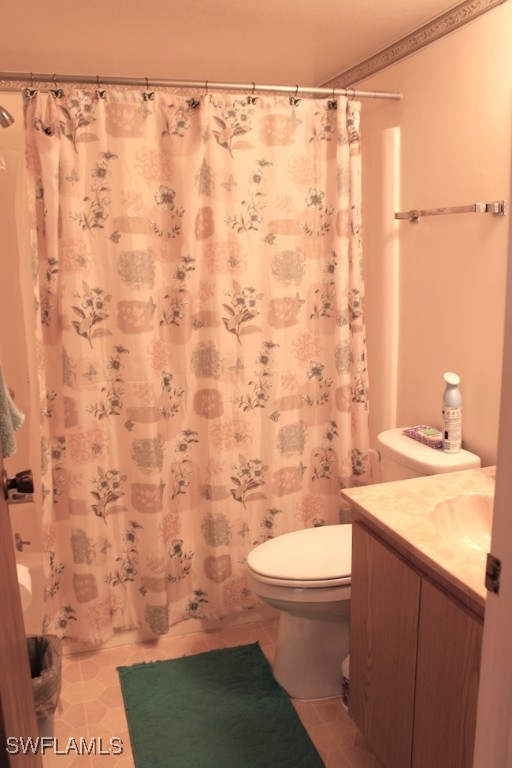 1221 Barrett Road, Unit 905 North Fort Myers, FL 33903 - Photo 11 of 22 a bathroom with a toilet and a shower curtain