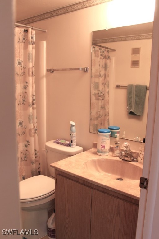 1221 Barrett Road, Unit 905 North Fort Myers, FL 33903 - Photo 12 of 22 a bathroom with a sink a toilet and shower