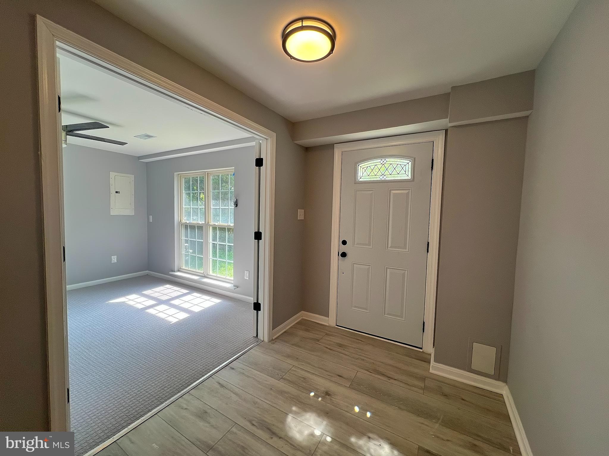 9864 Greenbriar Way Middle River, MD 21220 - Photo 2 of 17 a view of an empty room and window