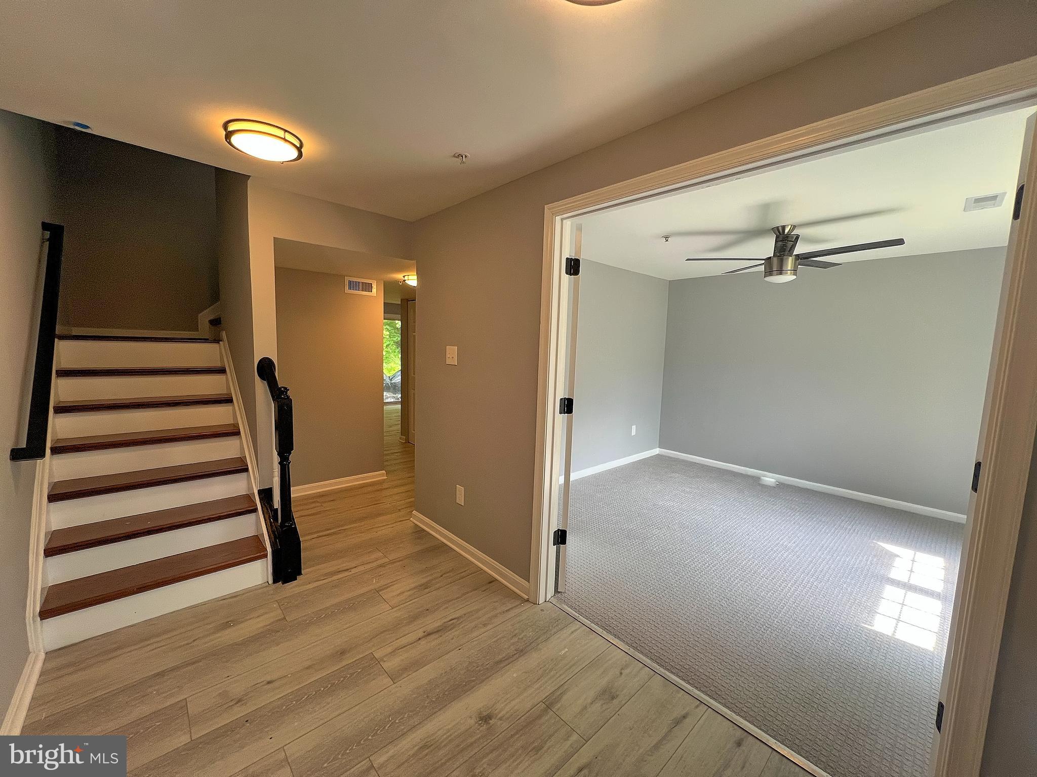 9864 Greenbriar Way Middle River, MD 21220 - Photo 3 of 17 wooden floor in an empty room