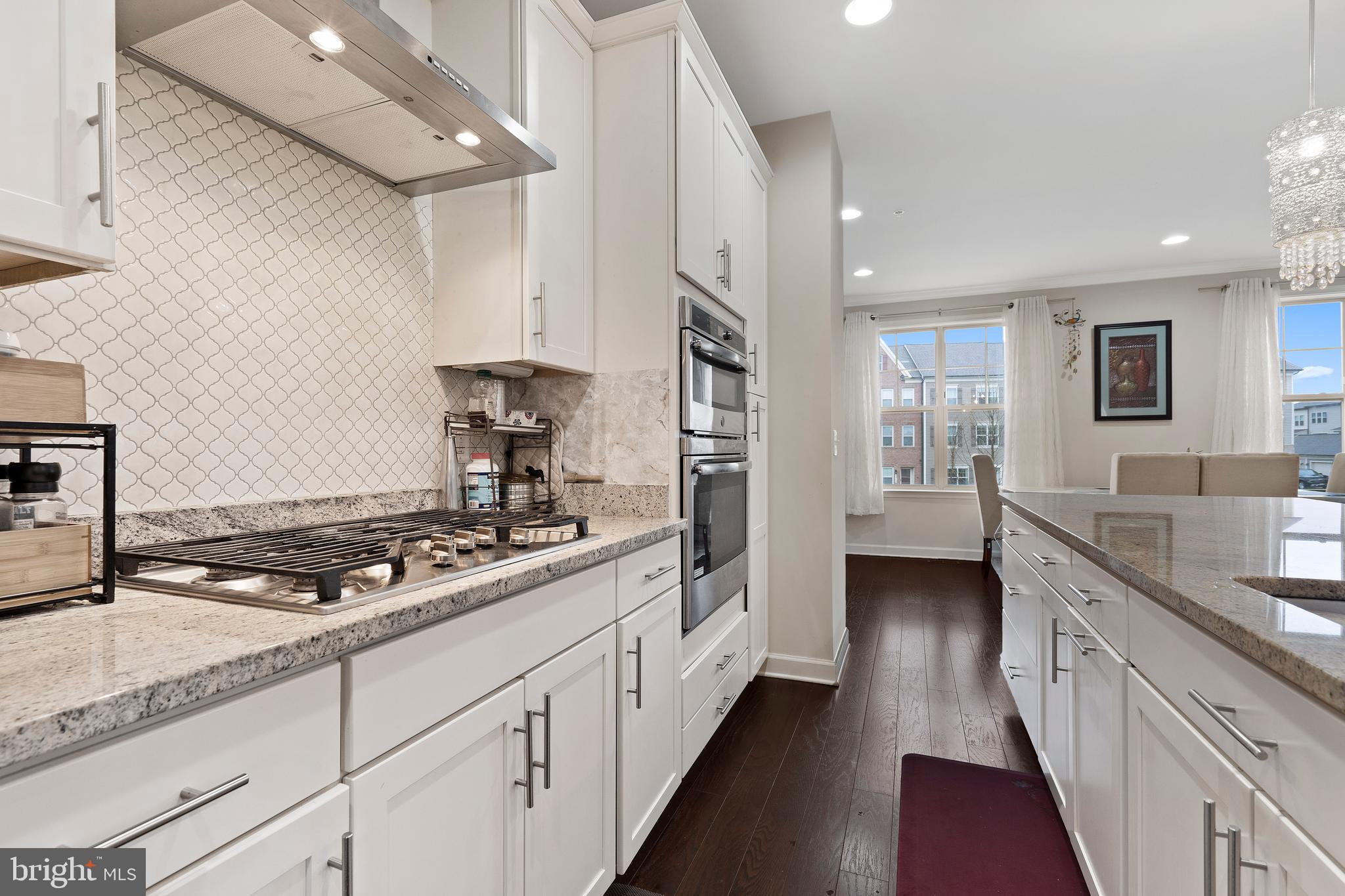 3516 Flatwoods Drive Frederick, MD 21704 - Photo 12 of 41 a kitchen with stainless steel appliances granite countertop a stove and a sink