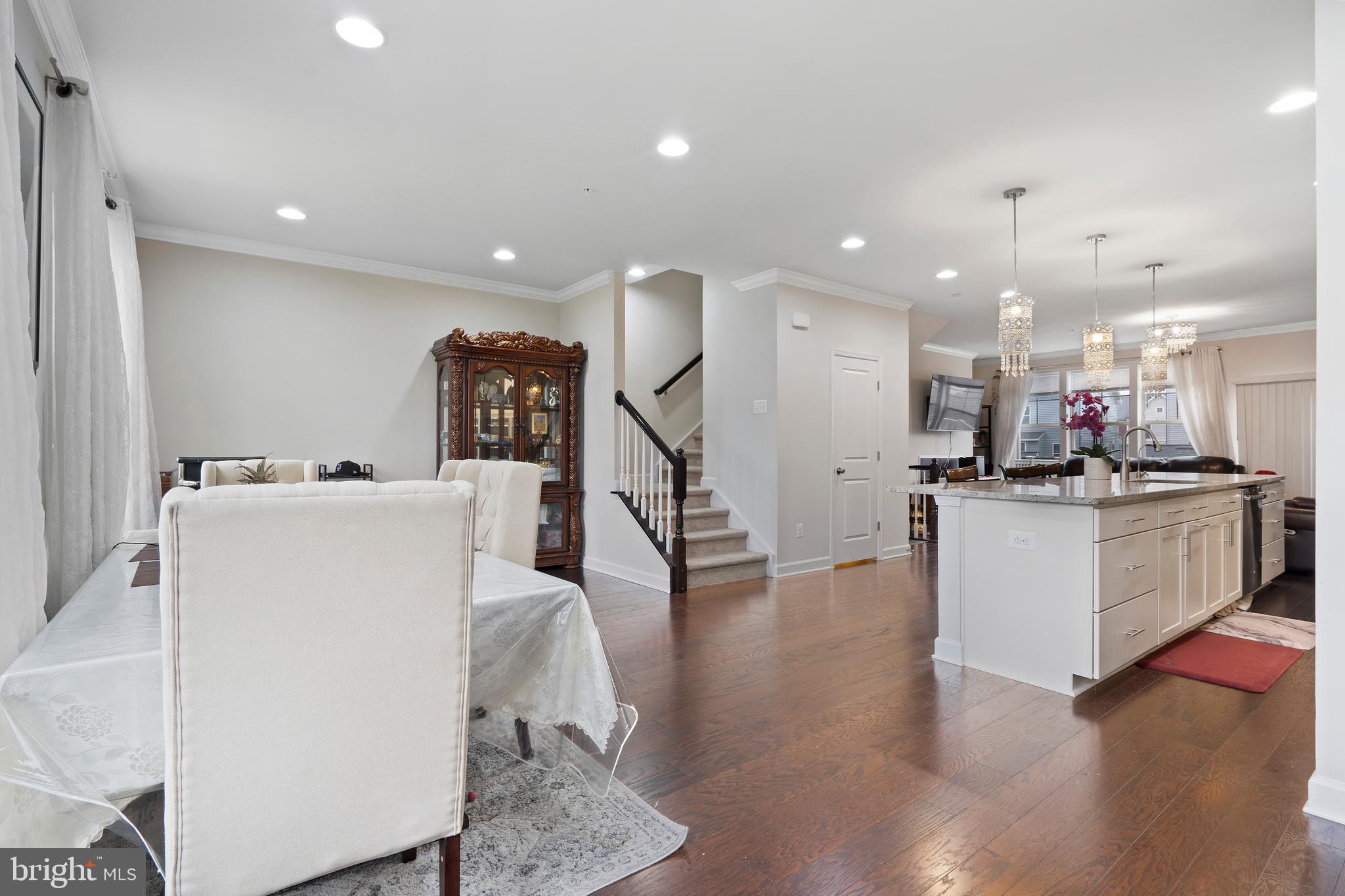 3516 Flatwoods Drive Frederick, MD 21704 - Photo 15 of 41 a living room with furniture and kitchen view