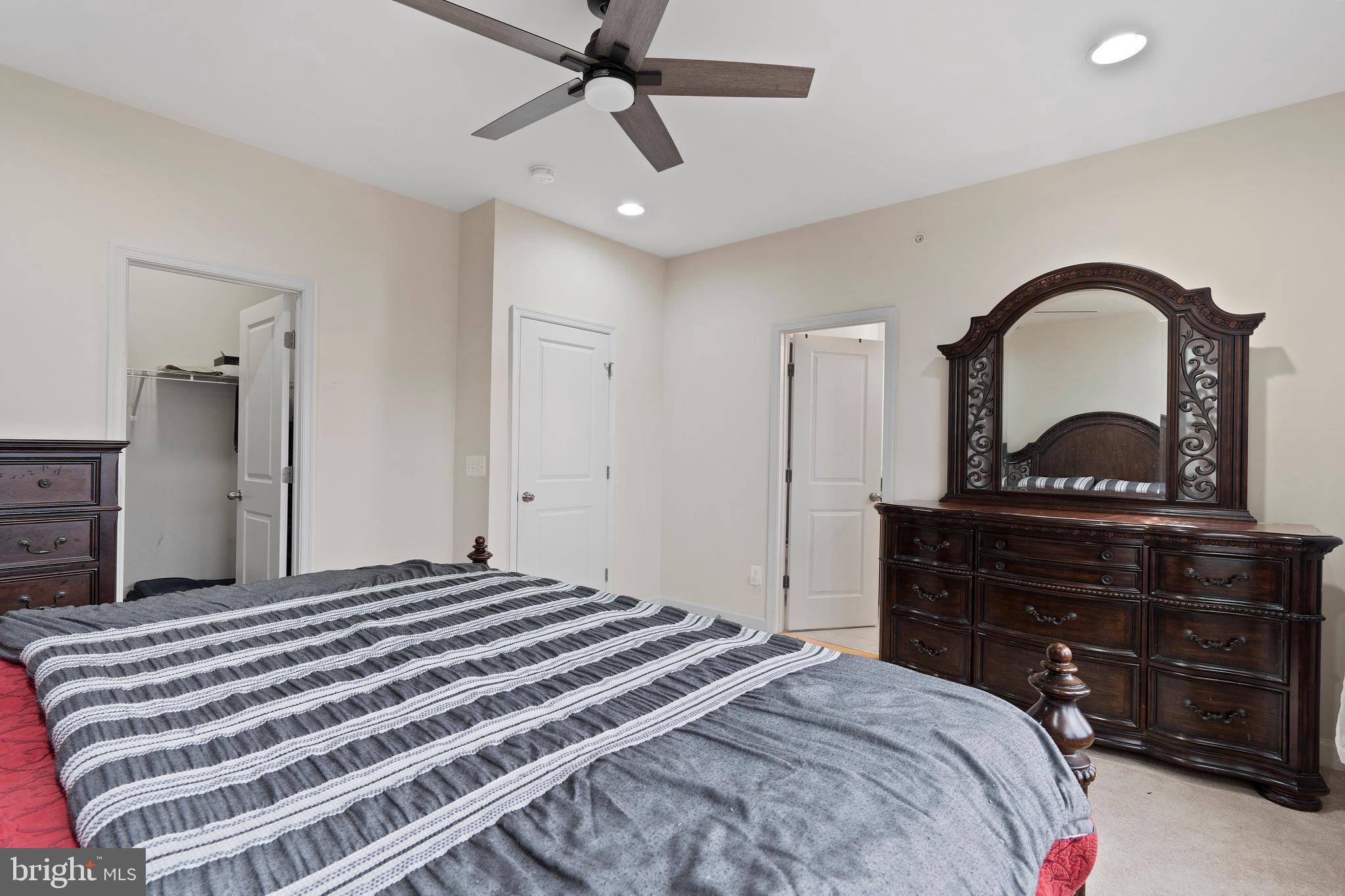 3516 Flatwoods Drive Frederick, MD 21704 - Photo 19 of 41 a bedroom with a bed and a dresser