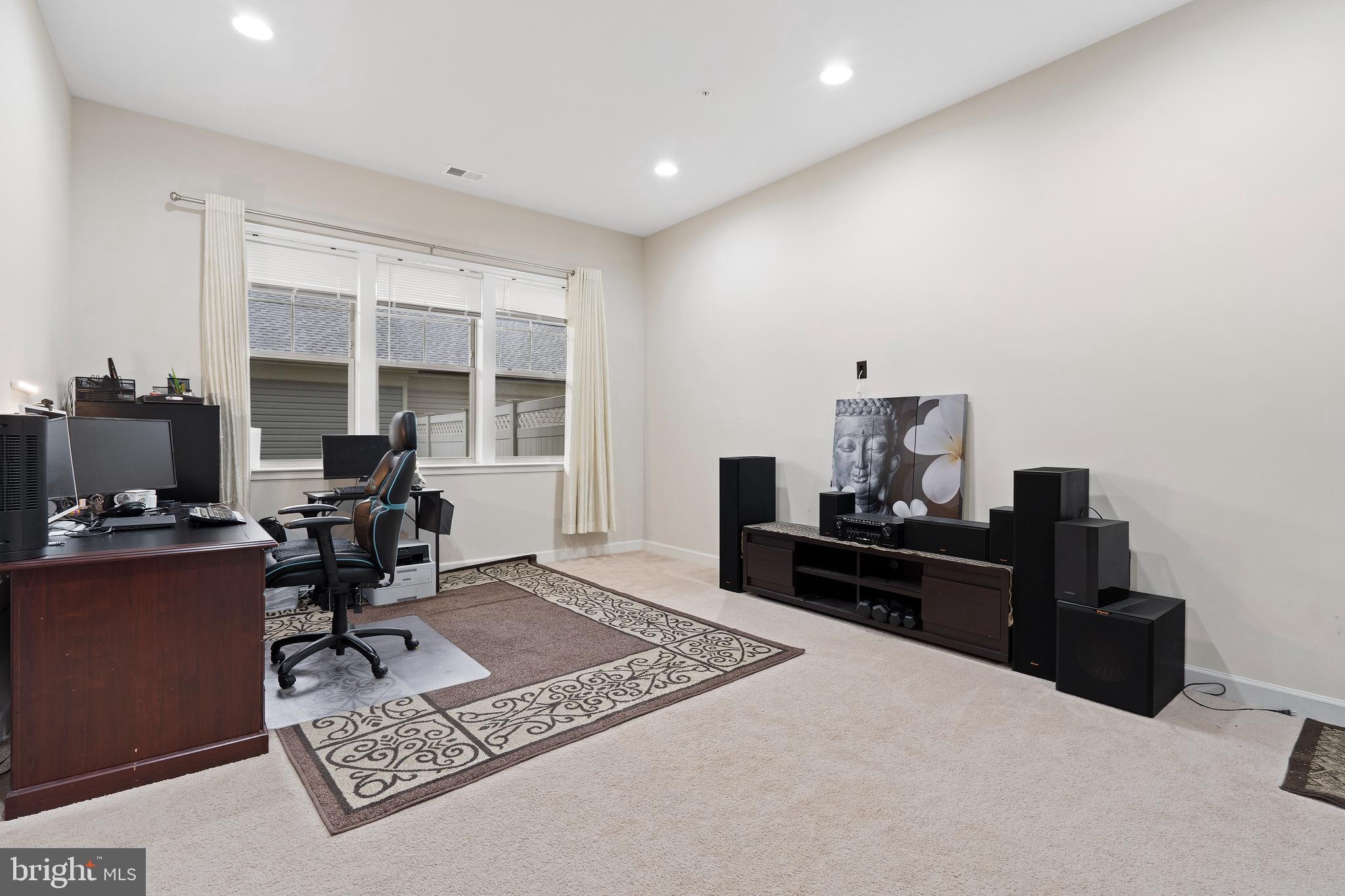 3516 Flatwoods Drive Frederick, MD 21704 - Photo 28 of 41 a living room with furniture rug and window