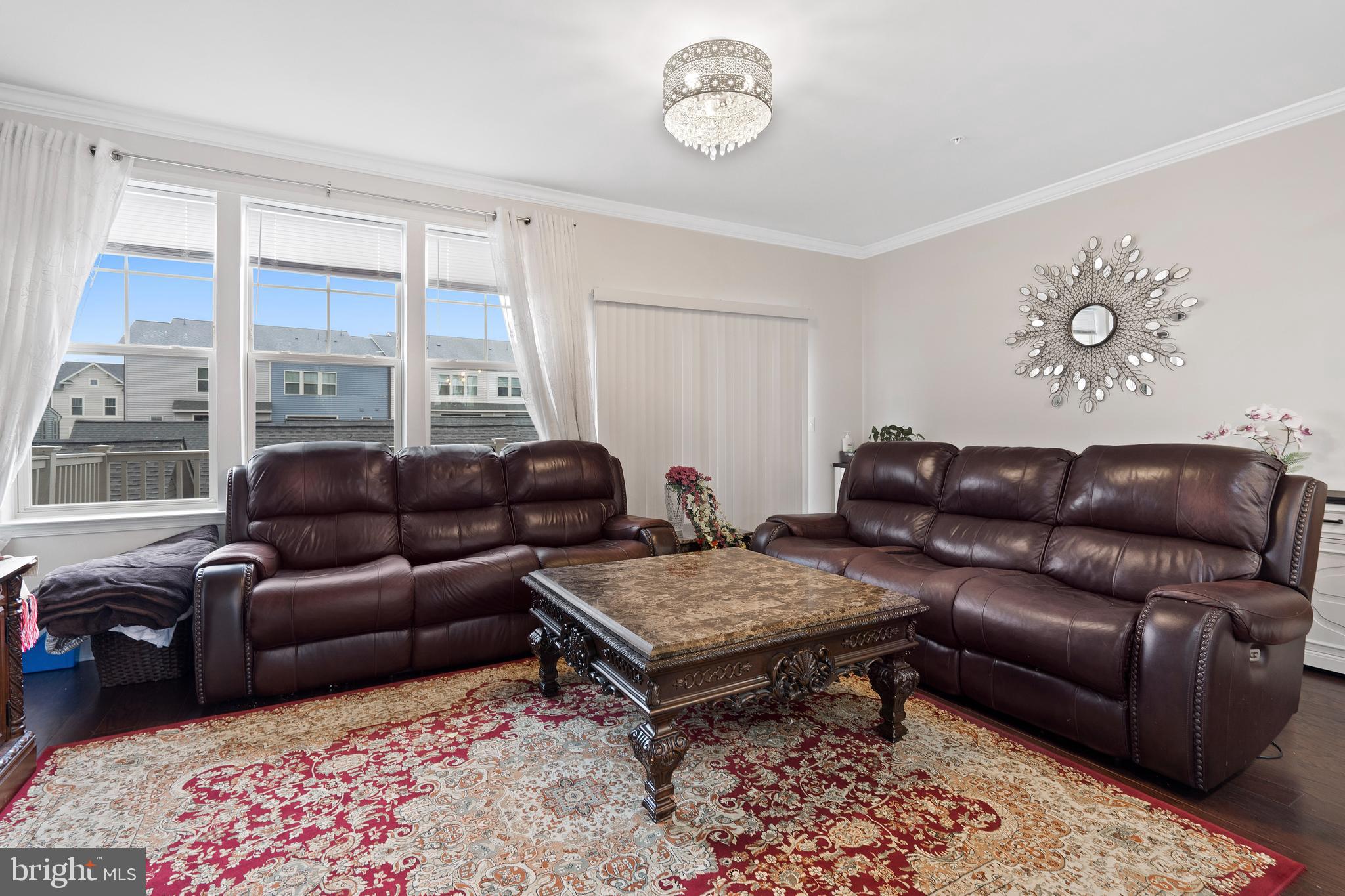 3516 Flatwoods Drive Frederick, MD 21704 - Photo 5 of 41 a living room with furniture a table and a large window