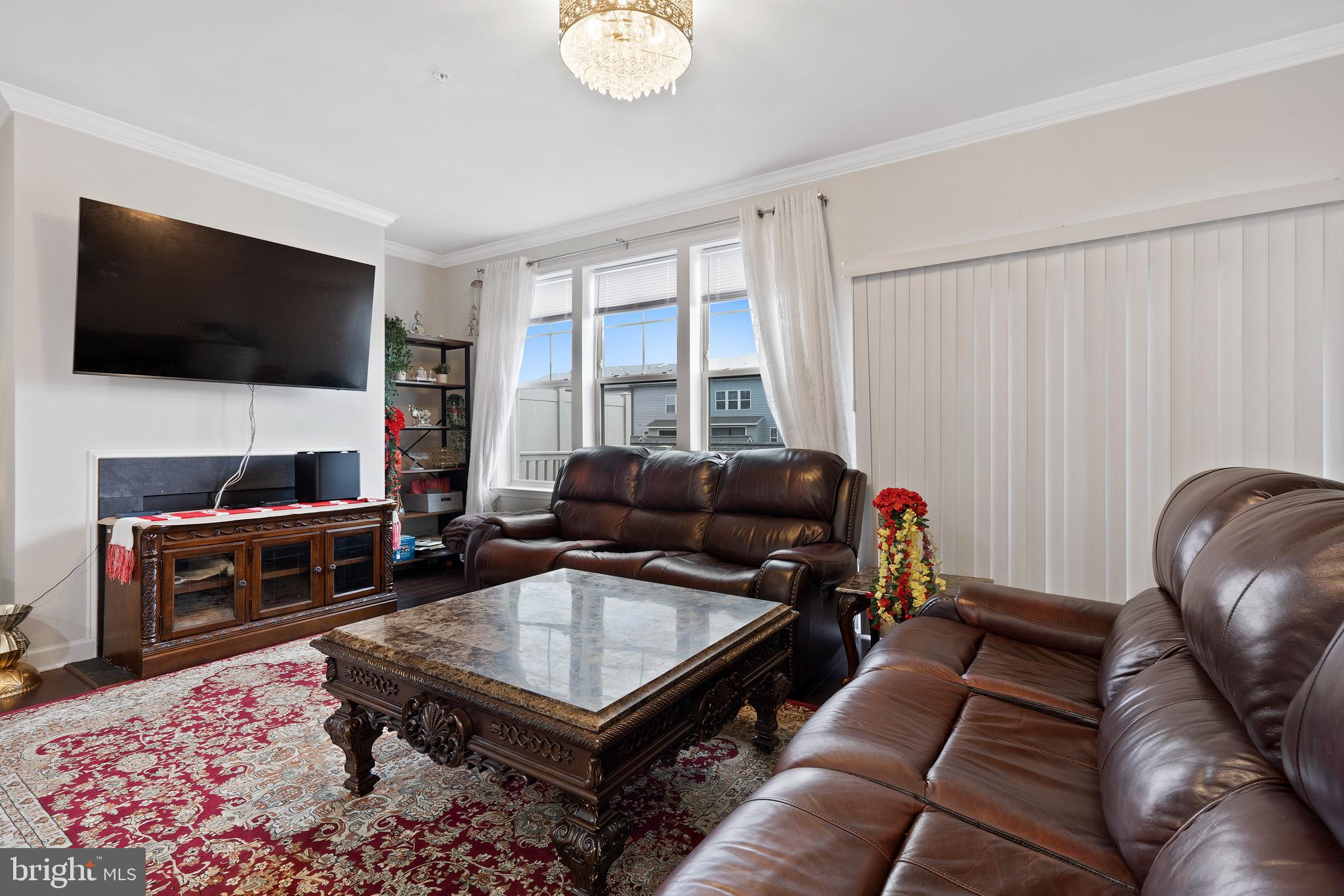 3516 Flatwoods Drive Frederick, MD 21704 - Photo 6 of 41 a living room with furniture and a flat screen tv