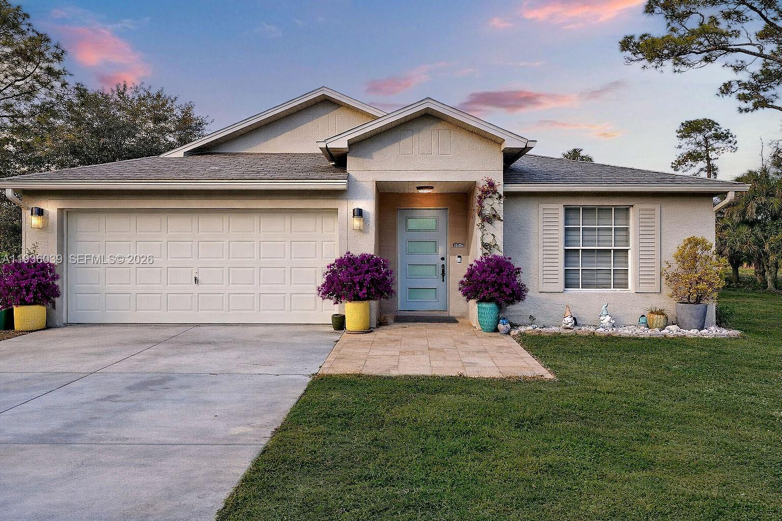 a front view of a house with yard