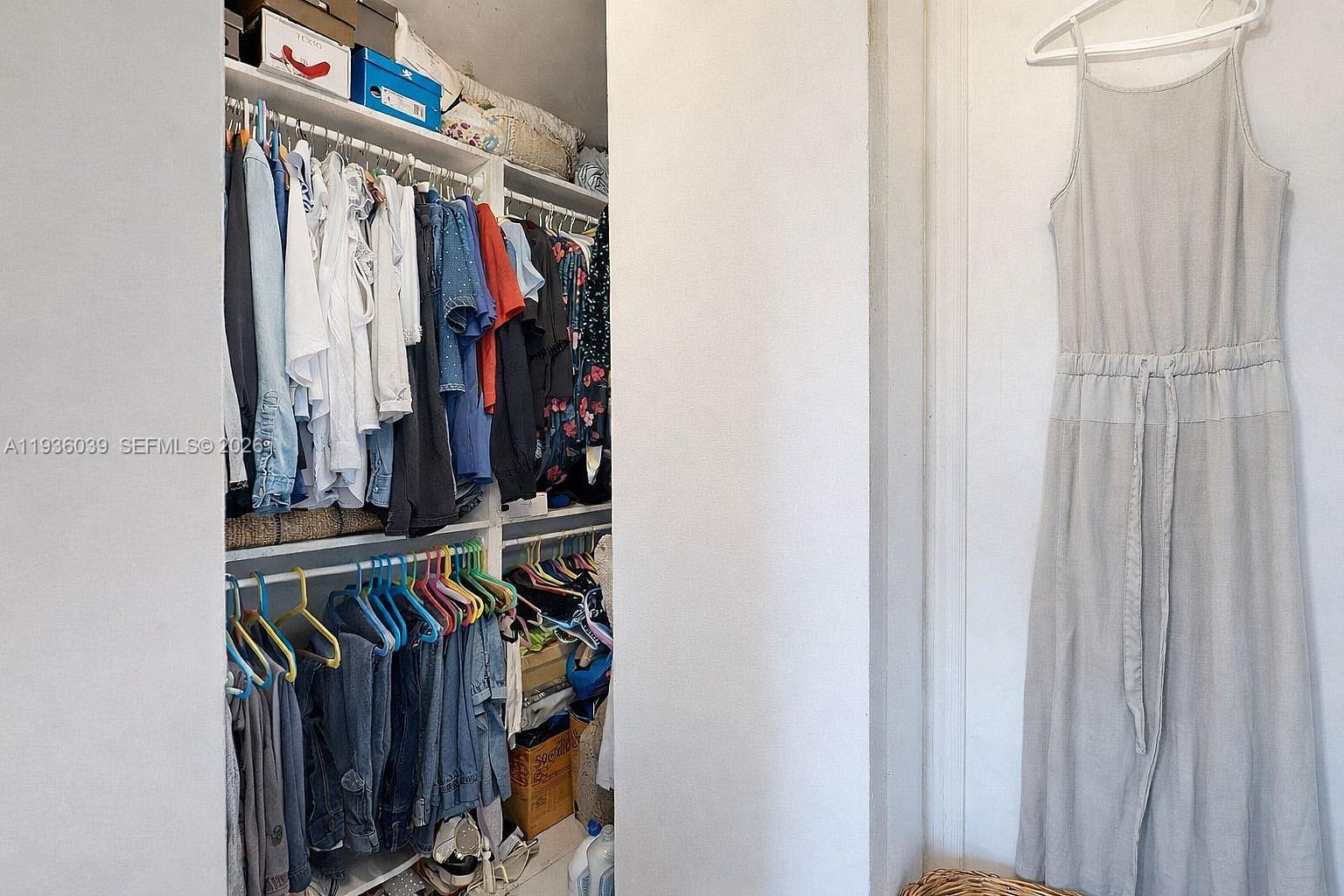 2625 40th Avenue Southeast Naples, FL 34117 - Photo 28 of 81 a view of walk in closet with clothes