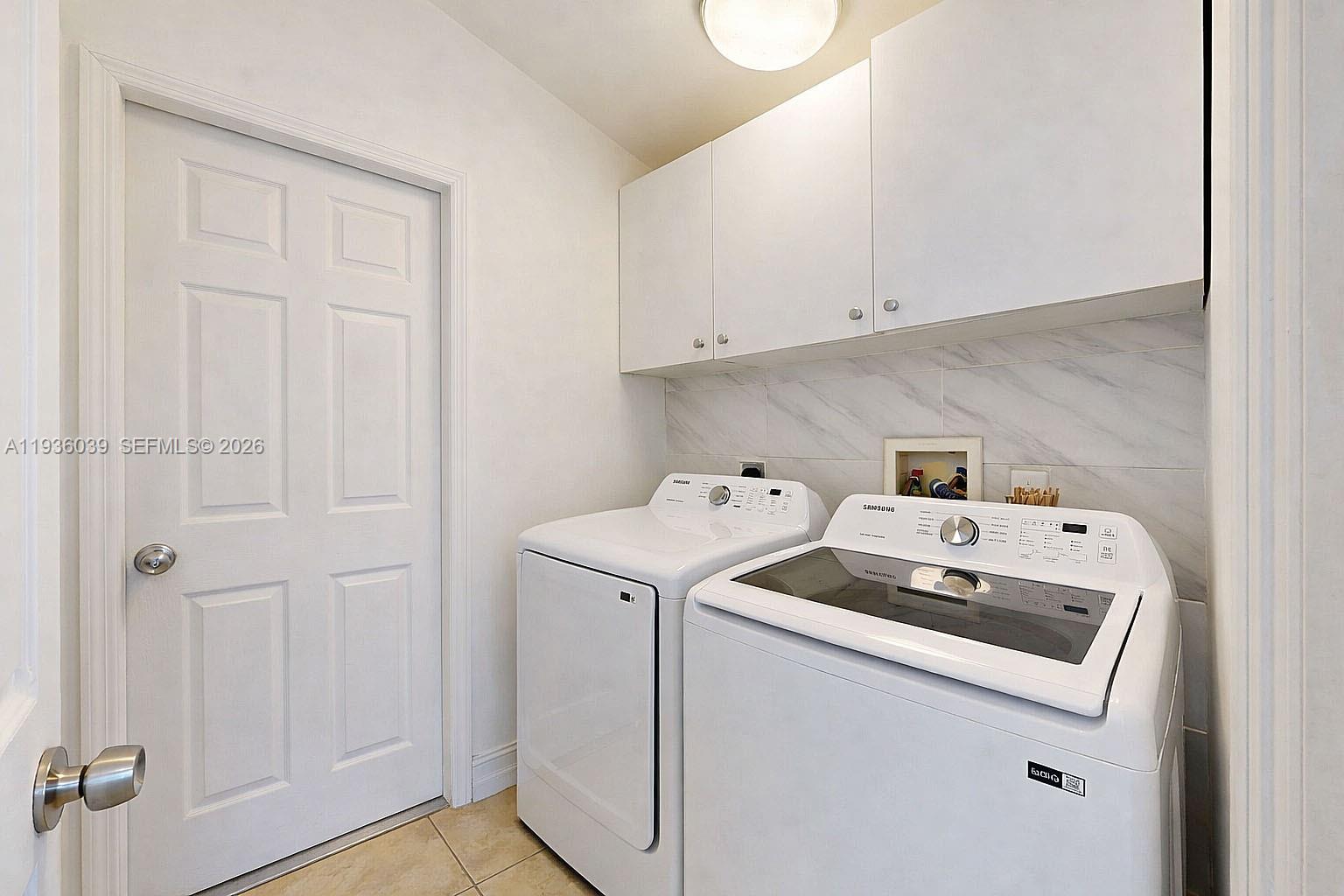 2625 40th Avenue Southeast Naples, FL 34117 - Photo 44 of 81 a utility room with dryer and washer