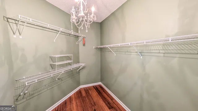 a view of a room with racks on the wall