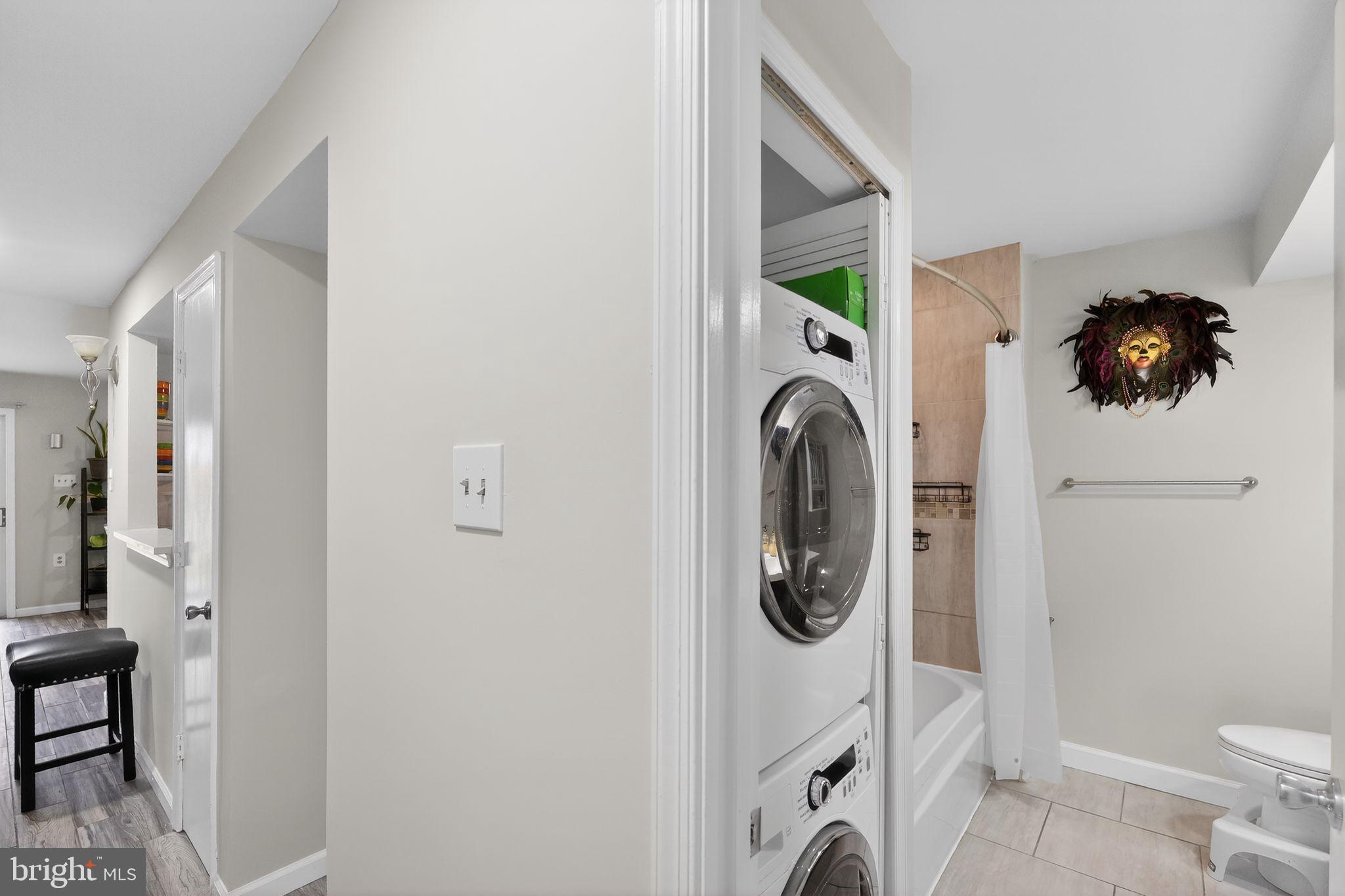 14229 Jib Street, Unit 12 Laurel, MD 20707 - Photo 15 of 17 a bathroom with a toilet and a shower