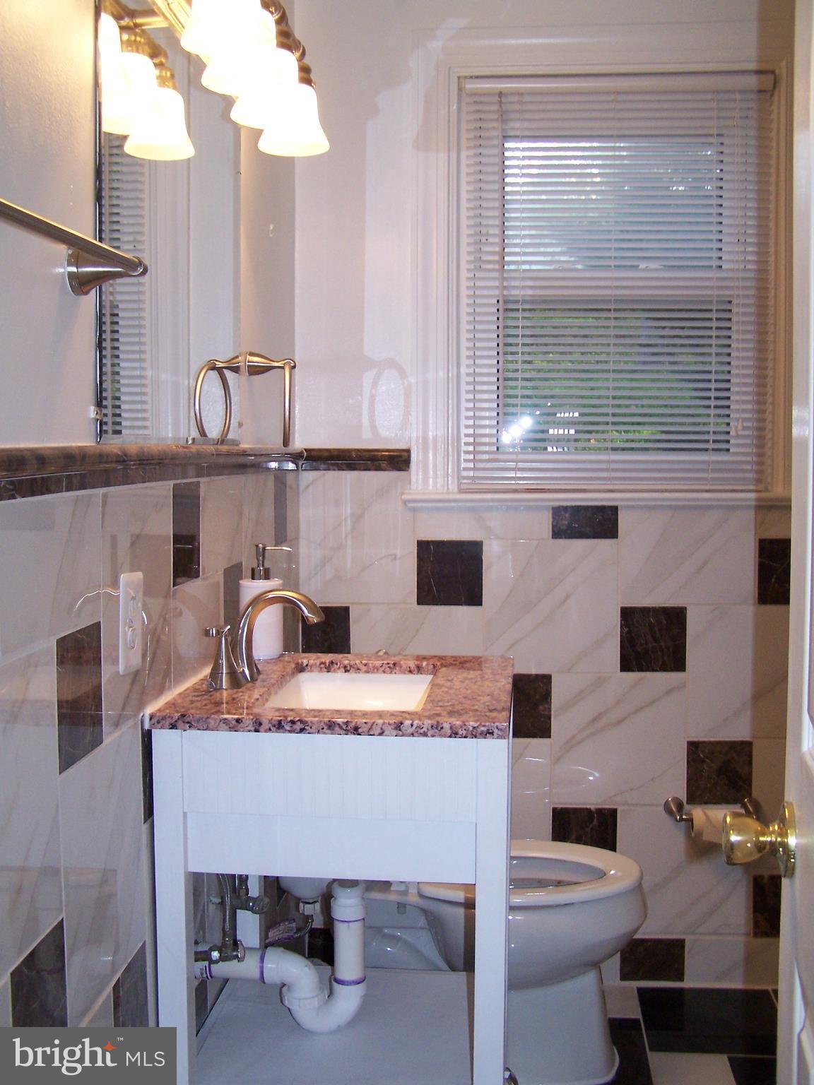 12215 Judson Road Silver Spring, MD 20902 - Photo 8 of 16 all ceramic bath
