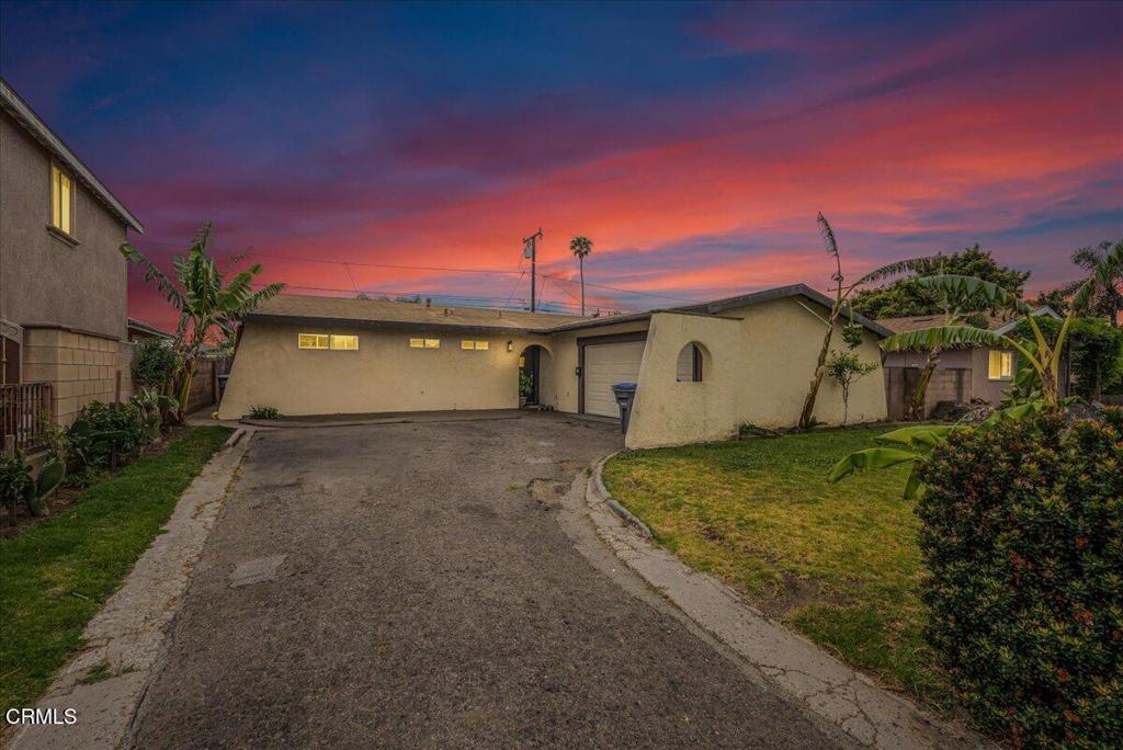 970 Laurel Street West Oxnard, CA 93033 - Photo 1 of 40 a house view with a garden space