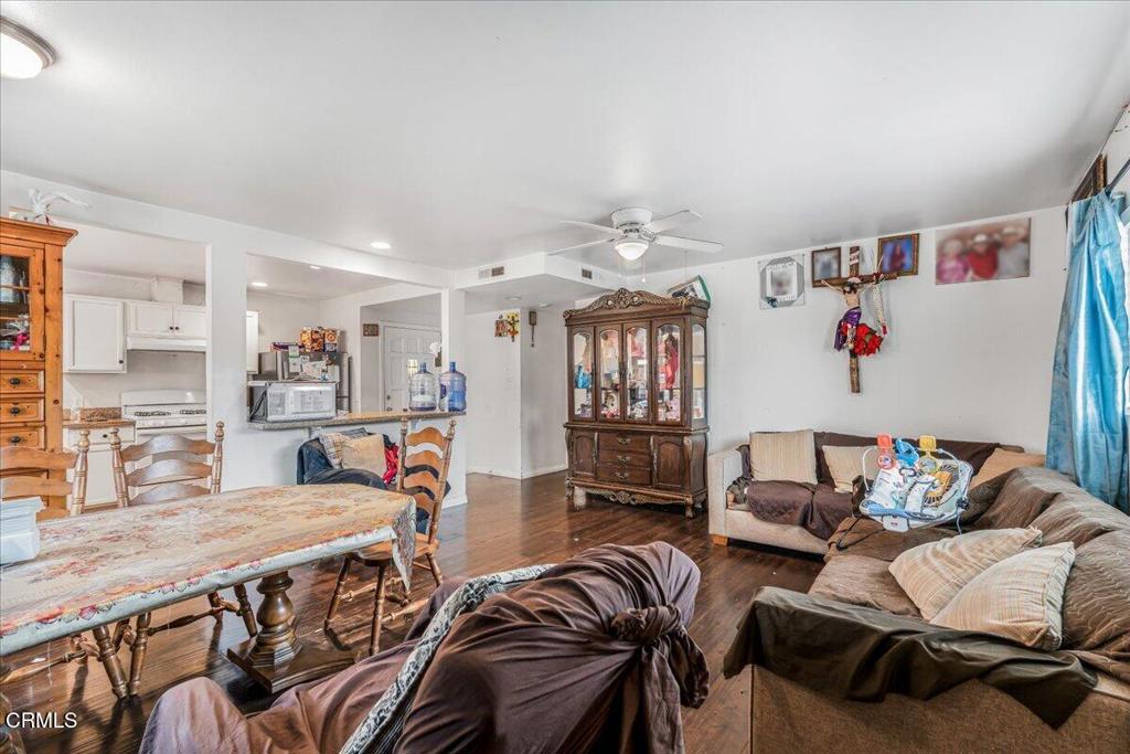 970 Laurel Street West Oxnard, CA 93033 - Photo 16 of 40 a living room with furniture and a wooden floor