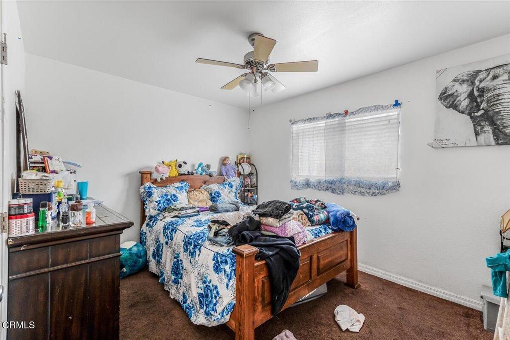 970 Laurel Street West Oxnard, CA 93033 - Photo 18 of 40 a bed room with furniture and a window