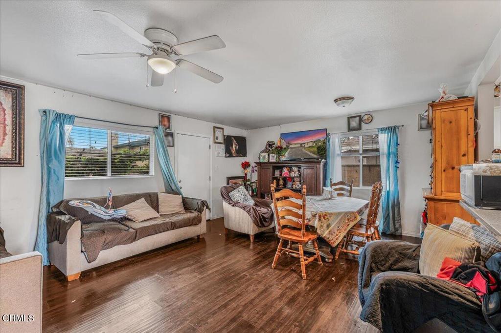 970 Laurel Street West Oxnard, CA 93033 - Photo 29 of 40 a living room with furniture and a large window
