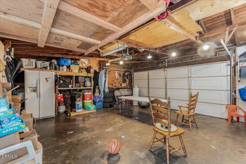 970 Laurel Street West Oxnard, CA 93033 - Photo 31 of 40 a view of a storage room with racks